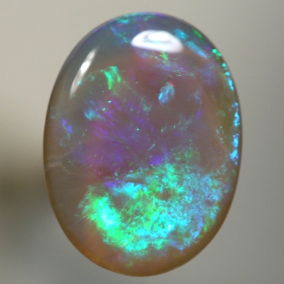 SOLID CRYSTAL OPAL Rolling flashes of green to purple